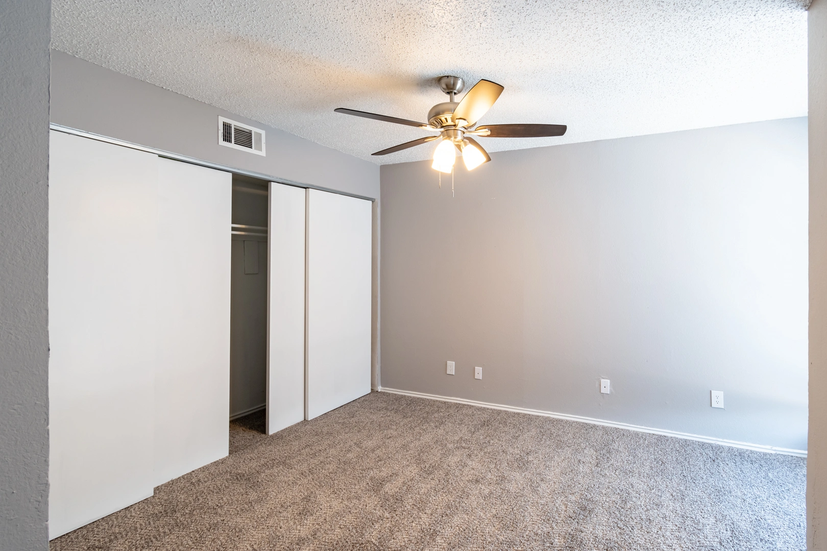 Bedroom with double closets at La Prada Place Apartment Homes