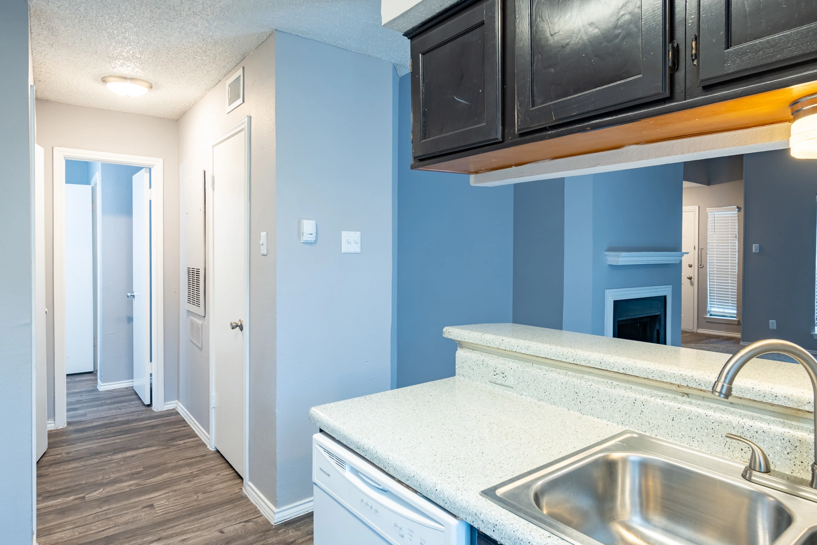 Hallway to bedrooms and bath at La Prada Place Apartment Homes