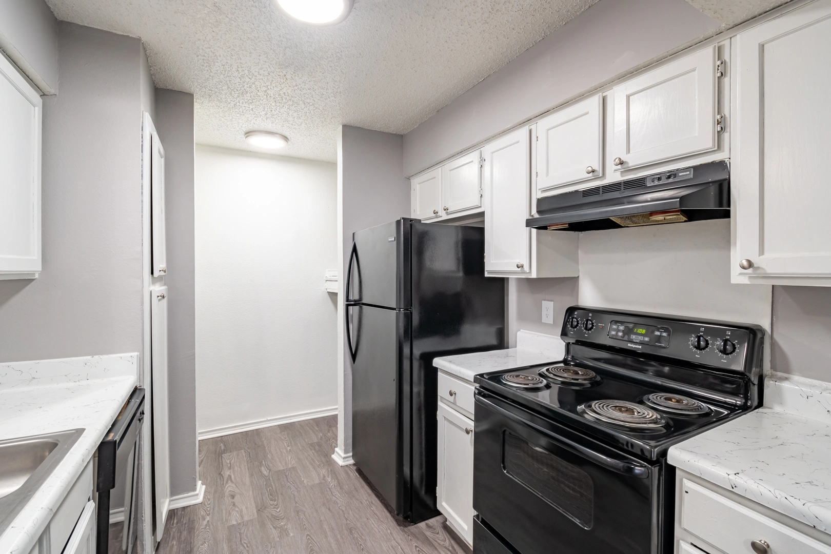 Classic white kitchen at La Prada Place Apartment Homes
