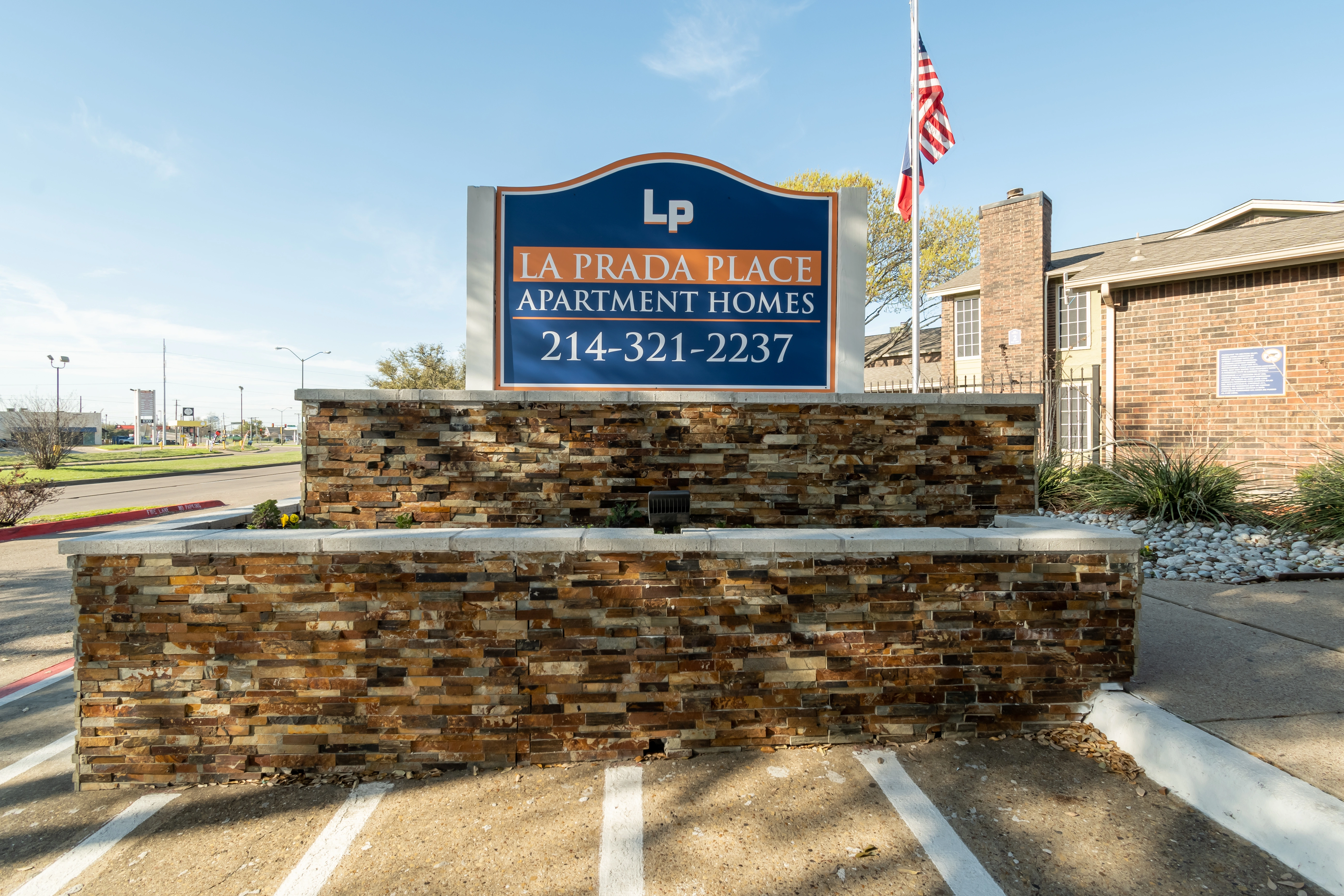 Monument entry sign at La Prada Place Apartment Homes