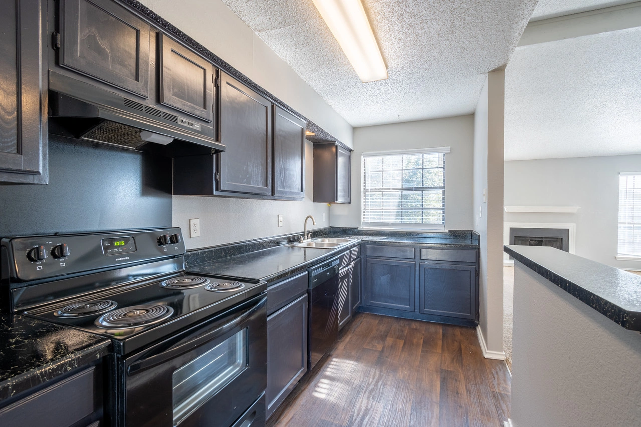 Kitchen counter and breakfast bar at La Prada Place Apartment Homes