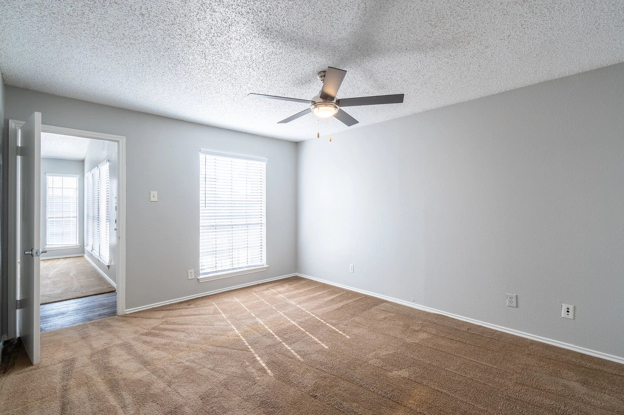 Primary bedroom corner view at La Prada Place Apartment Homes